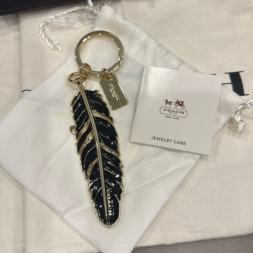 Coach new black gold feather key fob charm